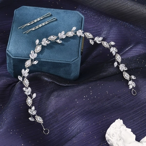 Detailed view of bridal silver rhinestone vine headband with marquise crystals