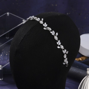 Detail of silver vine headband with marquise rhinestones on a mannequin head