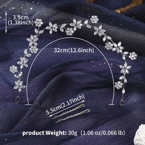 Detailed view of crystal floral headband with dimension labels and silver hair clips