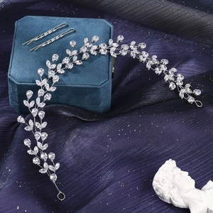 Elegant bridal hair vine set with marquise and teardrop zircons on velvet box