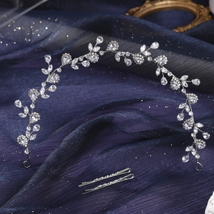 Elegant silver floral bridal headband set with rhinestones and matching wave hair clips