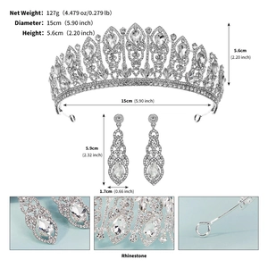 Macro details of silver bridal crown and teardrop earrings set with rhinestone specs