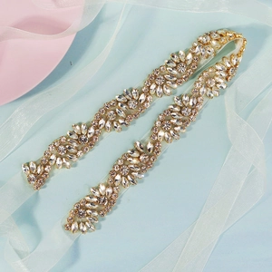 Detailed close-up of handmade marquise crystal wedding belt with white organza ribbon