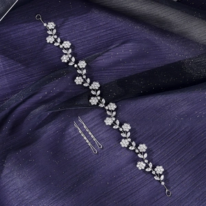 Elegant silver floral crystal headband with vine motifs and matching hair clips for wedding bridal