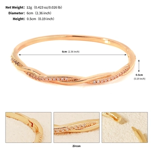Detailed views of gold-plated zircon bangle showing measurements and clasp mechanism
