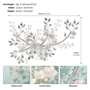 Detailed size and material macro of bridal hair comb with pearls and white flowers