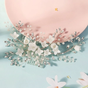Handmade bridal hair comb with white ceramic flowers, pearls and rhinestones on silver wire
