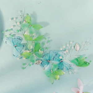 Handmade butterfly fairy hairband with green organza wings and white pearls