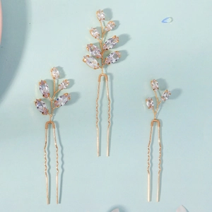 Lot de trois épingles à cheveux dorées avec feuilles en strass pour les mariages