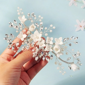 Handmade bridal hair comb with white ceramic flowers, pearls and crystals on silver base