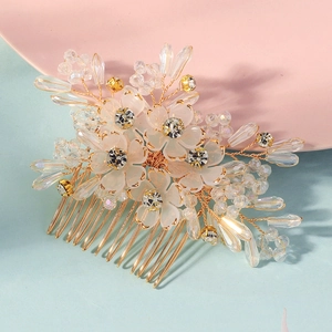 Elegant handmade crystal flower hair comb with white petals and golden beads for weddings