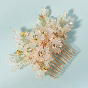 Exquisite handmade crystal flower hair comb with gold wire and sparkling white petals