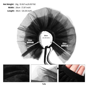 Detail view of black tulle clown collar showing fabric texture and pleated mesh layers