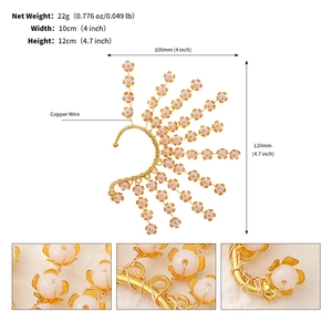 Detail showing dimensions of handmade crystal flower ear cuff with copper wire weaving