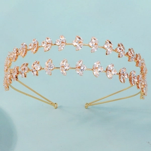 Macro detail of luxury double-layered gold zircon headband with marquise leaf pattern