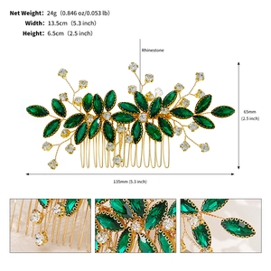 Detail of vintage green rhinestone hair comb with golden leaf patterns and dimensions
