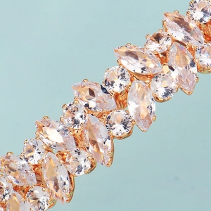 Close-up of marquise-cut marquise-cut cubic zirconia crystals set in gold-plated setting