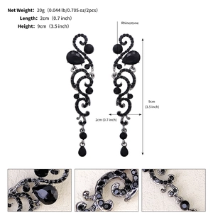 Detail showing 9cm vintage teardrop earrings with black rhinestones and product dimensions