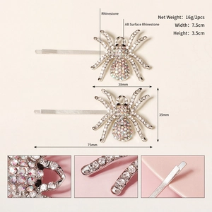 Detailed macro view showing rhinestone texture and dimensions of the spider hair clips