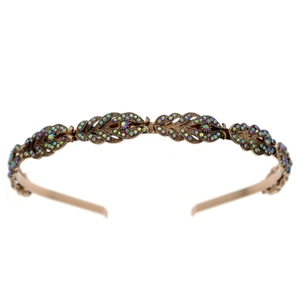 Detailed close-up of a gold bridal headband featuring sparkling rhinestones and leaf motifs