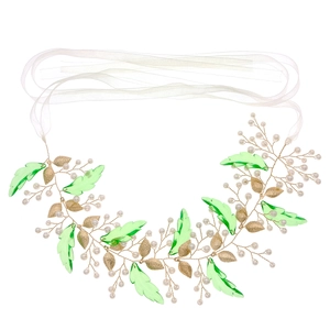 Bridal forest style leaf headband with gold wire, green crystals, and pearls on white ribbon