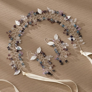 Handmade bridal hair vine and earrings set with purple crystals and silver leaves
