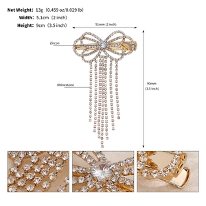 Detailed view of rhinestone bow hair clip with tassel, showing precise 5.1x9cm dimensions