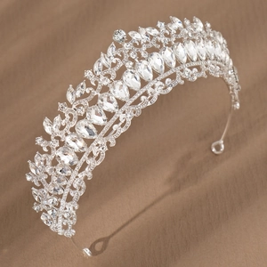 Macro shot of silver bridal crown featuring marquise rhinestones and alloy crystals