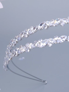 Macro view of silver layered headband with marquise and round cut sparkling crystals