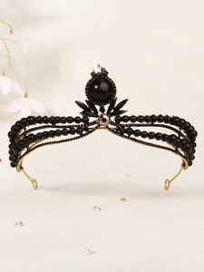 Macro shot of French vintage black beaded bridal crown with sparkling rhinestones and gems