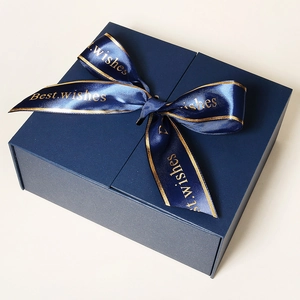 Navy blue square gift box featuring a satin bow and gold Best Wishes lettering