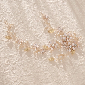 Bandeau de mariée vintage avec feuilles dorées, perles blanches et strass étincelants
