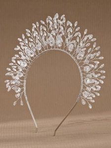 Close-up of handmade bridal headband with silver wire and white crystal beads