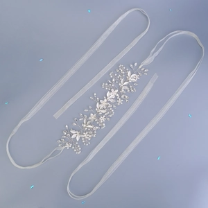 Luxurious bridal sash with silver leaves, white pearls and sparkling rhinestones