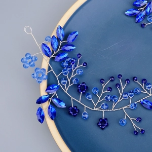 Serre-tête de mariée élégant en fil d'argent avec strass bleus et perles de cristal de luxe