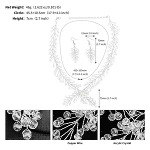 Macro detail of bridal crystal necklace and earrings set with measurements and materials