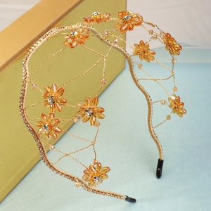 Handmade gold mesh headband with amber crystal flowers and white diamond accents