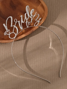 Detailed view of silver rhinestone Bride to Be headband for bridal shower and party