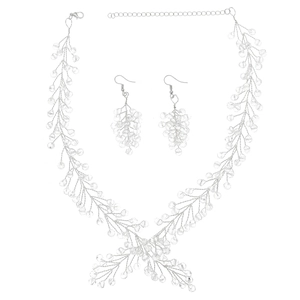 Luxury bridal jewelry set featuring crystal vine necklace and drop earrings in silver