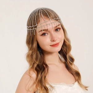 Elegant silver mesh headpiece with sparkling rhinestone fringe for bridal party hair styling