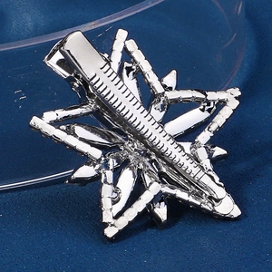 Sparkling silver star hair clip with crystals and rhinestones for elegant styling