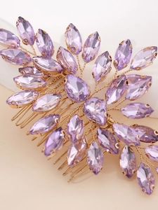 Detail of purple marquise crystal bridal hair comb with gold hand-woven wire