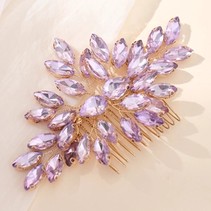 Handmade bridal hair comb with purple marquise crystals and golden leaf design