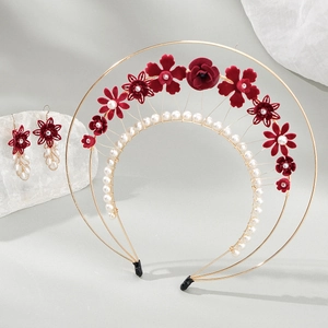 Elegant halo crown set with red velvet flowers and pearls on a golden metal frame