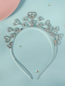 Detail of silver rhinestone heart tiara headband with sparkling crystal embellishments