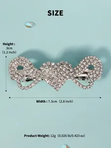 Size guide of rhinestone heart hair clip with 7.3cm width and 3cm height measurements