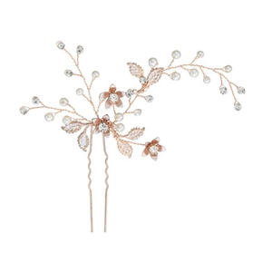 Détail d'épingle à cheveux florale or rose avec perles et strass pour un look élégant