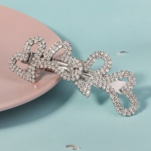 Elegant silver heart spring hair clip with shimmering rhinestones for women