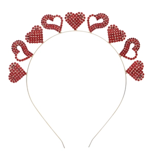 Golden metal headband featuring red rhinestone hearts for Valentine's Day celebrations