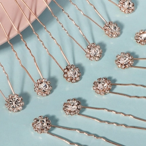 Épingles à cheveux marguerite en strass et or rose pour coiffures de mariée chic